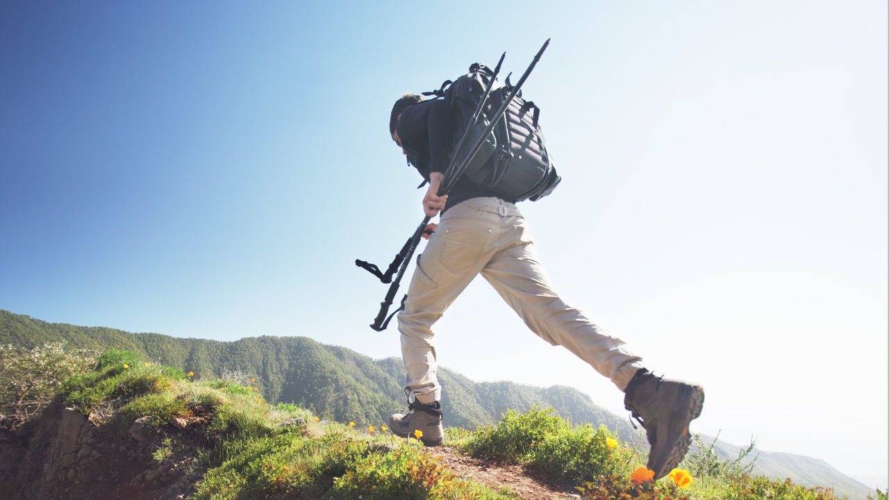 Man hiking up a mountain