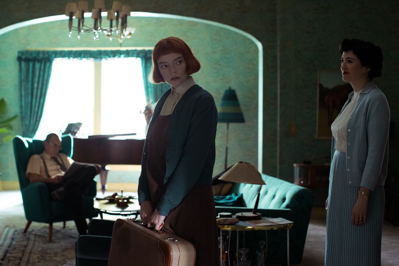 From left, Patrick Kennedy as Allston Wheatley, Anya Taylor-Joy as Beth Harmon, and Marielle Heller as Alma Wheatley in "The Queen's Gambit" on Netflix.