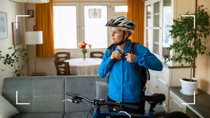 Woman adjusting jacket pocket with bike and helmet, about to do cycling as a workout