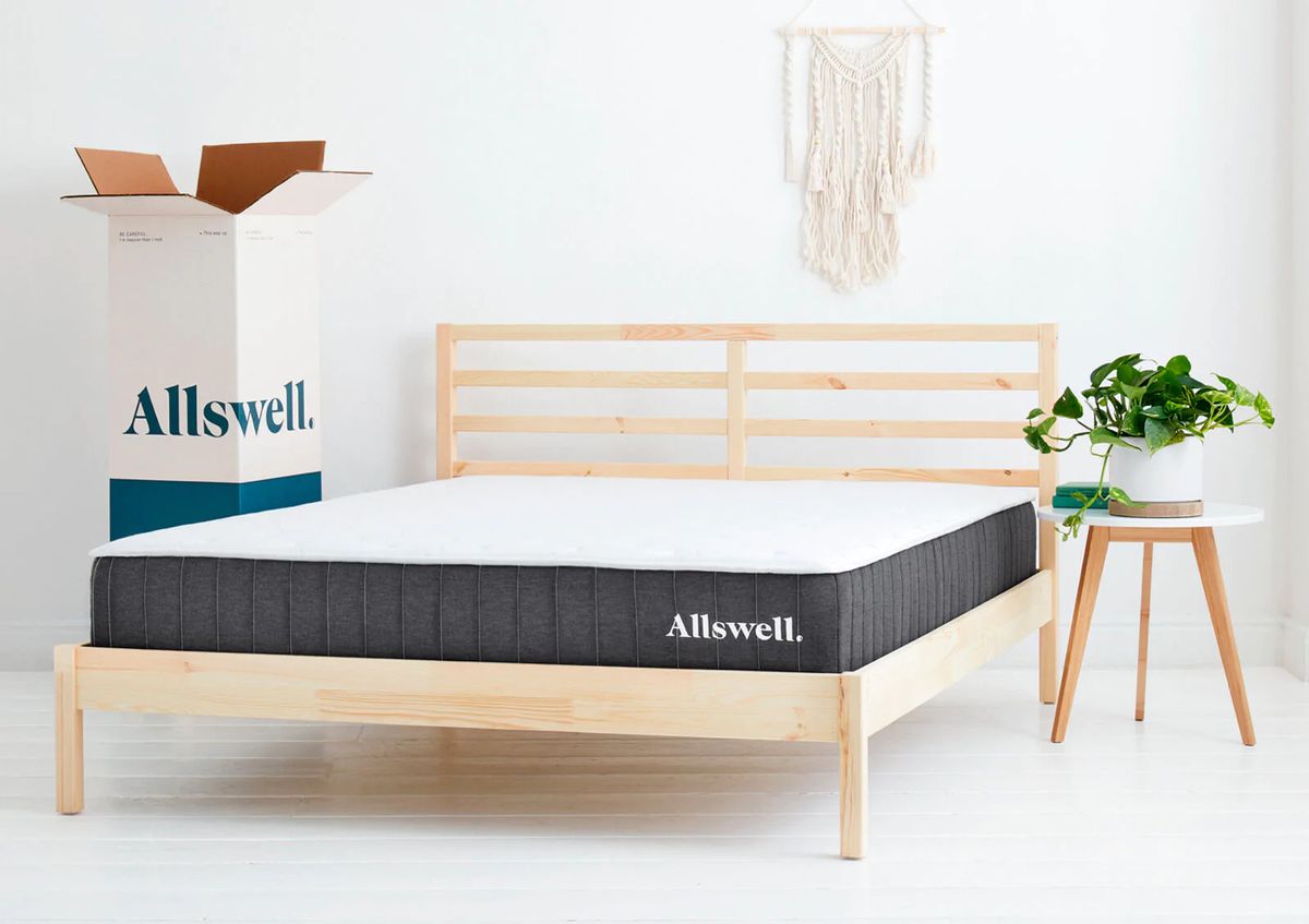 Allswell Mattress, on a wooden bedframe in a bedroom