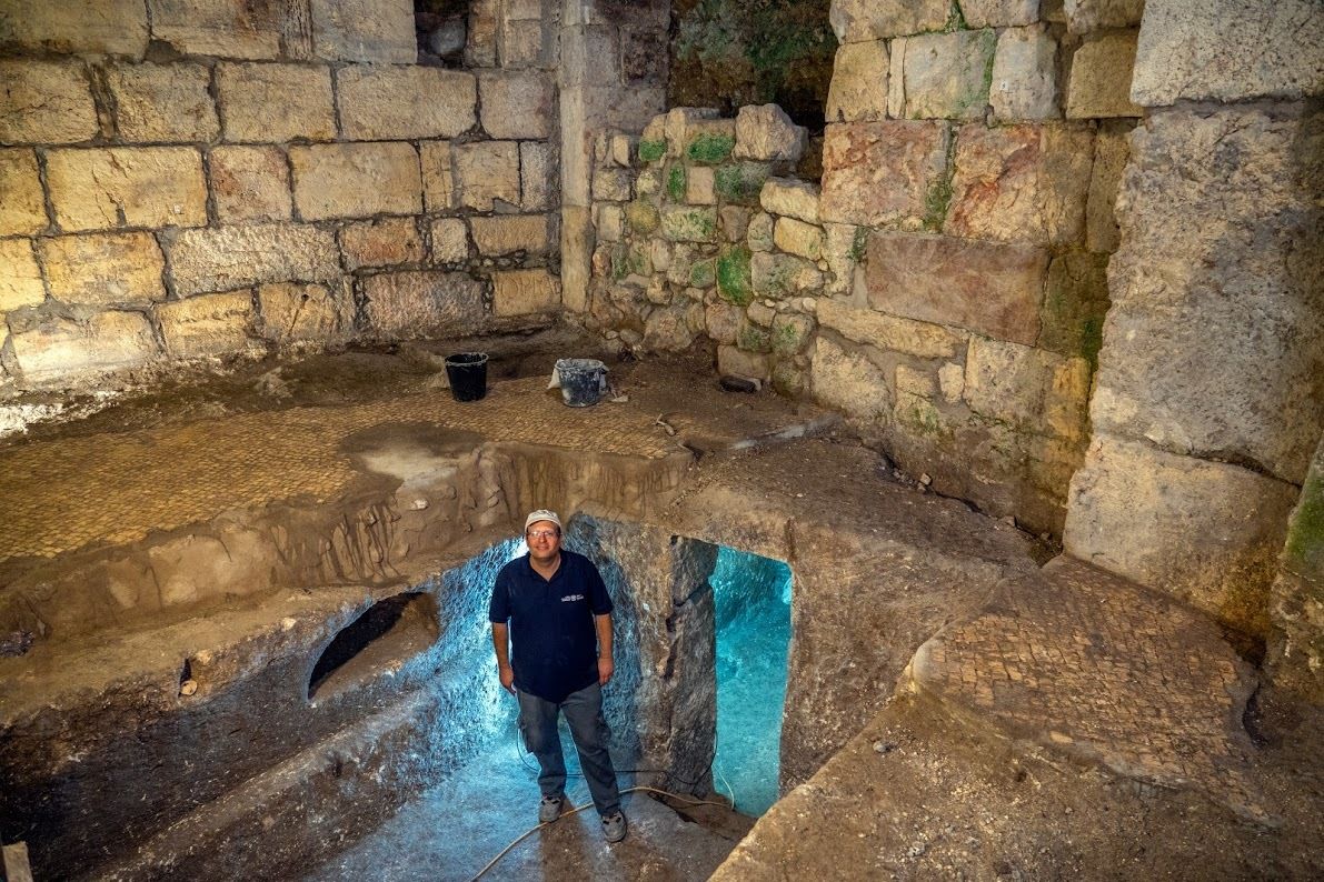 Co-director of the excavation Barak Monnickendam-Givon standing in the subterranean chambers.