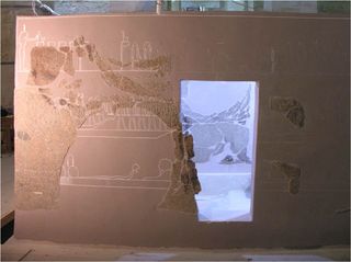 This scene depicts hour five of the "Amduat," a book that also chronicles the sun god's journey at night. In this section he passes through the cavern of a god named Sokar. When re-assembling the box archaeologists had to temporarily leave an opening that allowed them to work on the interior.