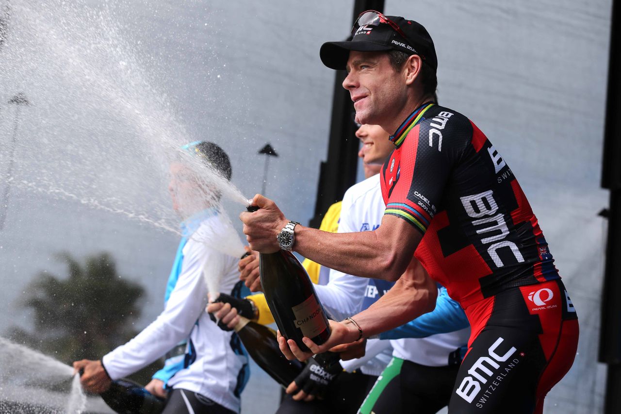 Cadel Evans (BMC) spraying champagne on the podium for the final time