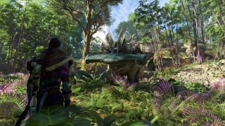 Still from the video game Avatar: Frontiers of Pandora. A Na'vi (tall, blue humanoid) is wearing brown leather armor is face to face with a large hammer-head land beast who is on all fours. They are both standing in a luscious forest with tall trees and purple-leafed plants.
