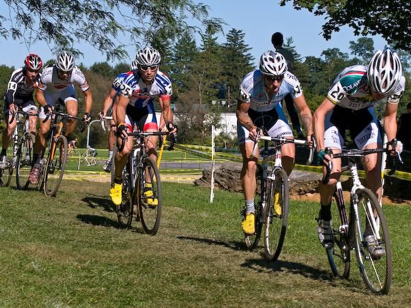 A group of seven riders pull away from the field.