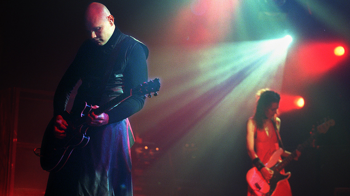 Billy Corgan, lead singer of Smashing Pumpkins, plays at Univeral Ampitheatre on 5/23/00. In background is bassist Melissa Auf Der Maur
