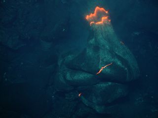 A jumbled pillow lava forms at the base of Hades vent at West Mata submarine volcano.