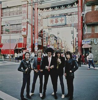 Thin Lizzy posing at the entrance of Yokohama China Town, Yokohama, September 1980