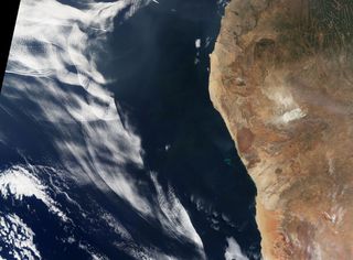 On June 26, 2016, NASA's Terra satellite snapped this image of gravity waves off the coast of Africa.