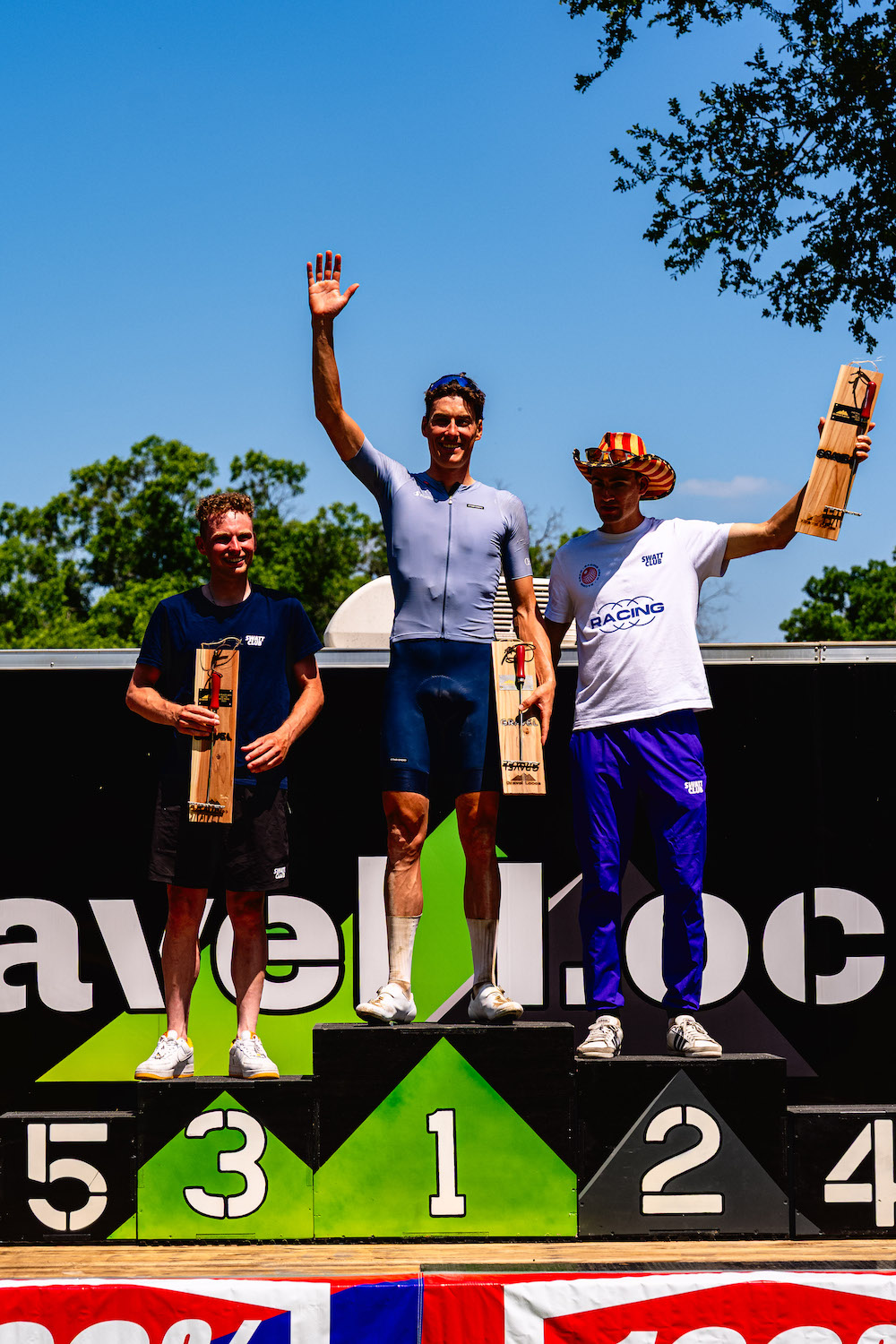 The men's podium of Gravel Locos 2025 with Ramon Sinkeldam first, Alexander Miller second and Jordy Bouts in third