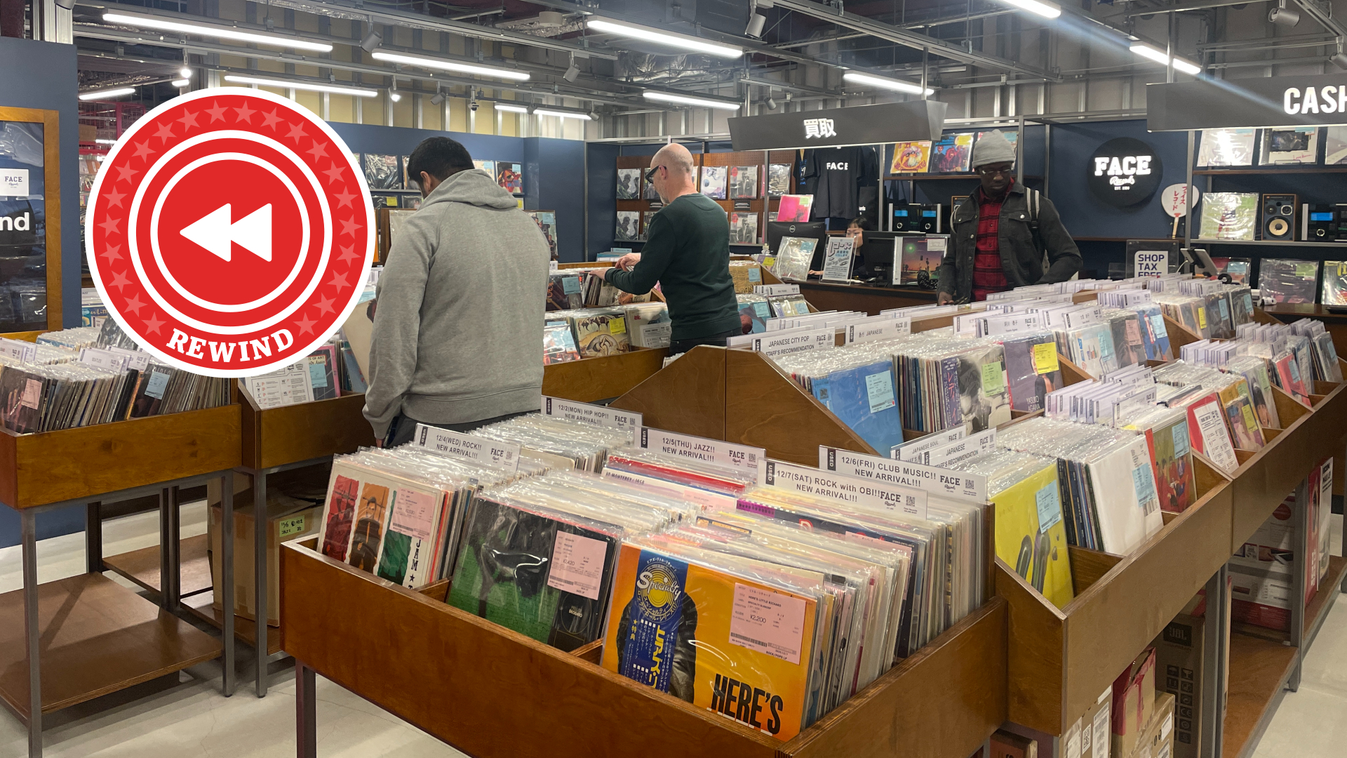 Vinyl shoppers in store with Rewind logo
