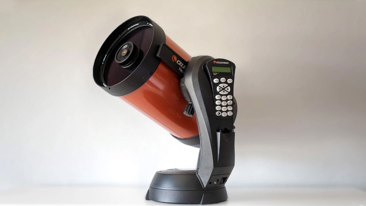 Celestron 8SE against a white wall