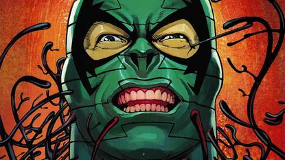 The Scorpion being enveloped by the Venom symbiote