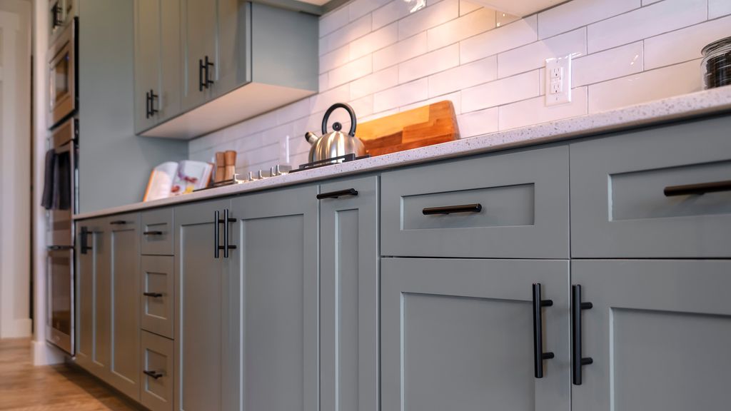How to clean gloss kitchen cabinets without damaging them | Ideal Home