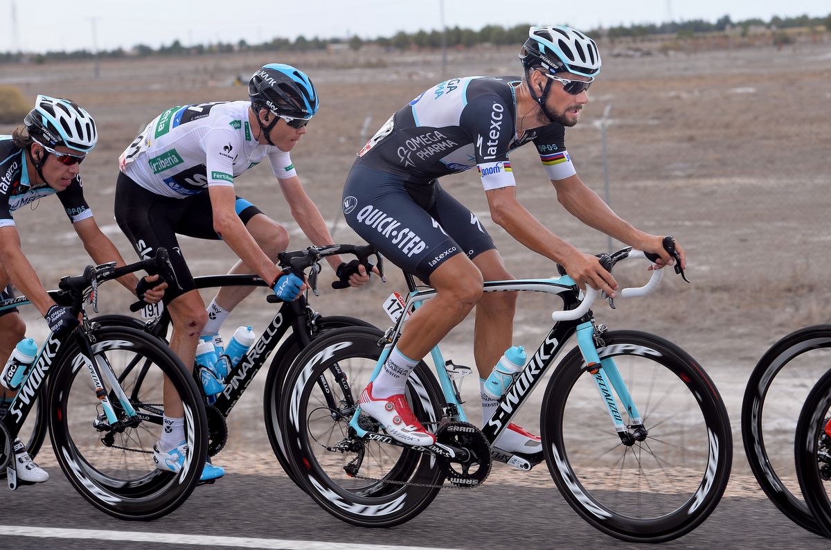 Tom Boonen is followed by Chris Froome at the Vuelta a Espana