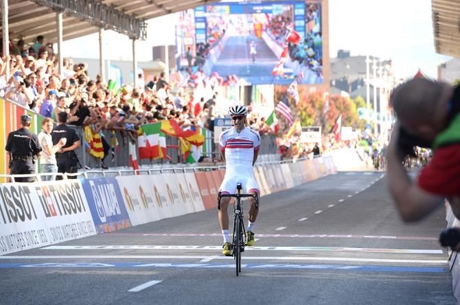 Norway's Sven Erik Bystrom takes a solo victory in the under-23 men's race