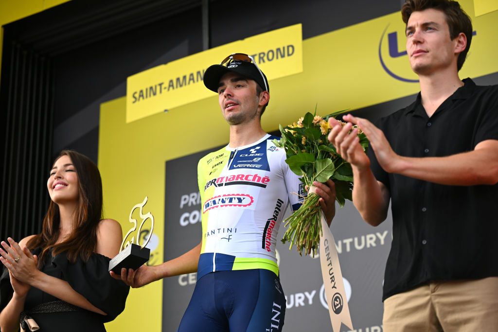 SAINTAMANDMONTROND FRANCE JULY 09 Kobe Goossens of Belgium and Team Intermarche Wanty celebrates at podium as most combative rider prize winner during the 111th Tour de France 2024 Stage 10 a 1873km stage from Orleans to SaintAmandMontrond UCIWT on July 09 2024 in Orleans France Photo by Tim de WaeleGetty Images