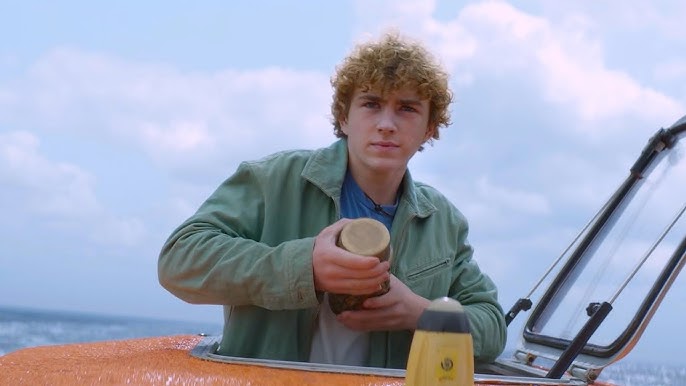 Walker Scobell as Percy Jackson, standing in a submersible