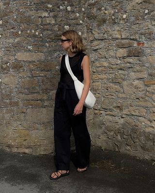 @brittanybathgate wearing black linen trousers and top