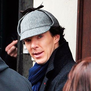 Sherlock holmes with grey coloured cap