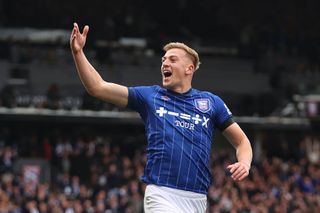 Liam Delap of Ipswich Town celebrates scoring his team's first goal during the Premier League match between Ipswich Town FC and Aston Villa FC at Portman Road on September 29, 2024 in Ipswich, England.