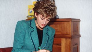 gorslas, united kingdom november 16 diana, princess of wales signing a visitors book in wales photo by tim graham photo library via getty images