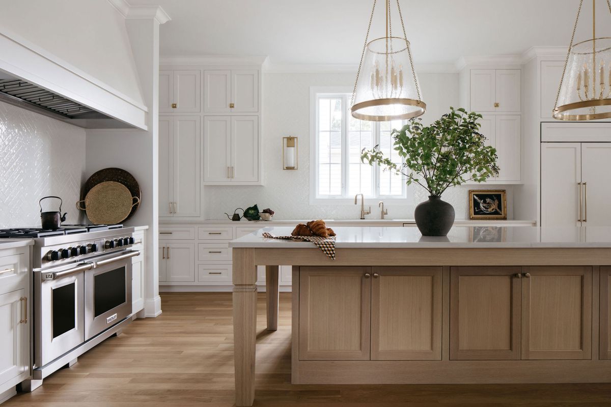 Do You Put Flooring Under Kitchen Cabinets? Remodelers Advise