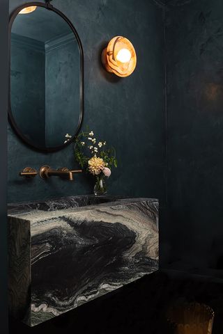 black powder room by LALA Reimagined