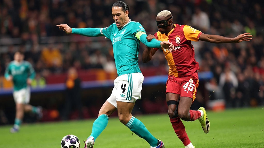 Virgil van Dijk and Victor Osimhen battle for the ball during Liverpool vs Galatasaray Champions League 2025/26