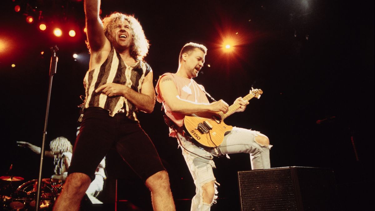Van Halen vocalist Sammy Hagar and guitarist Eddie Van Halen perform at the Target Center in Minneapolis, Minnesota on July 30, 1995