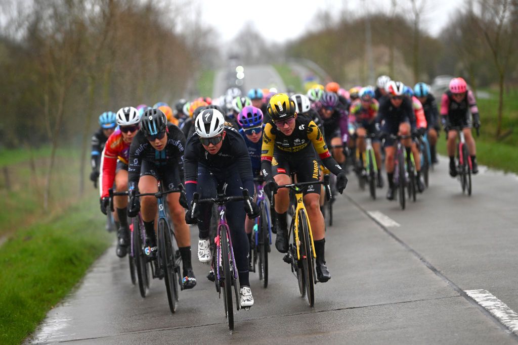 WEVELGEM BELGIUM MARCH 26 LR Lonneke Uneken of The Netherlands and Team SD Worx and Teuntje Beekhuis of The Netherlands and Team JumboVisma lead the peloton during the 12th GentWevelgem In Flanders Fields 2023 Womens Elite a 1625km one day race from Ypres to Wevelgem UCIWWT on March 26 2023 in Wevelgem Belgium Photo by Luc ClaessenGetty Images