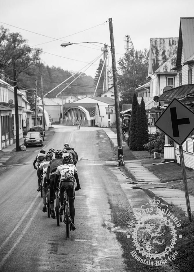 The lead pack rolls through Coburn&rsquo;s rural streets.