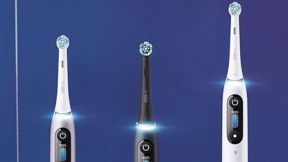 Oral B iO Series 9 toothbrush: three toothbrushes standing in a line