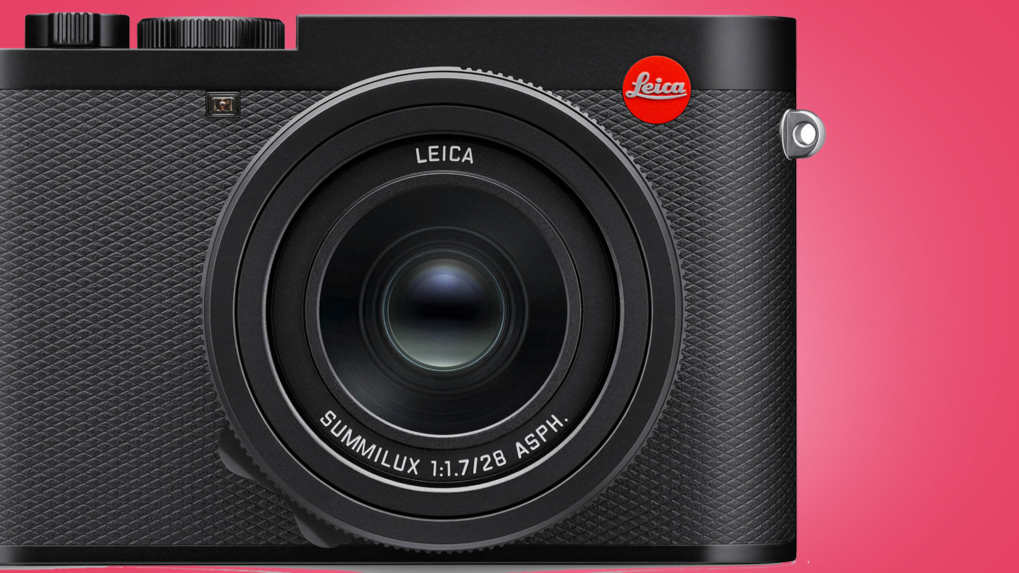 The Leica Q3 camera on a pink background