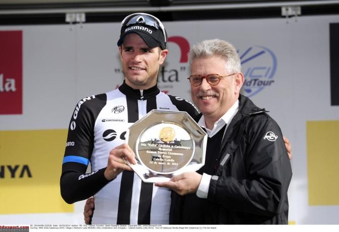 Stage winner Luka Mezgec (Giant Shimano) collects one of his many prizes for winning the stage