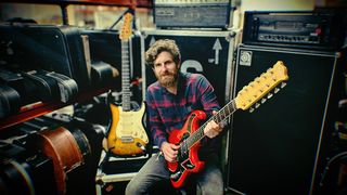 Auctioneer Luke Hobbs with Baldwin Double Six guitar
