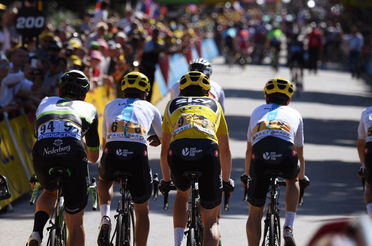 Bernie Eisel with the Sky trio of Landa, Thomas and Nieve approach the line