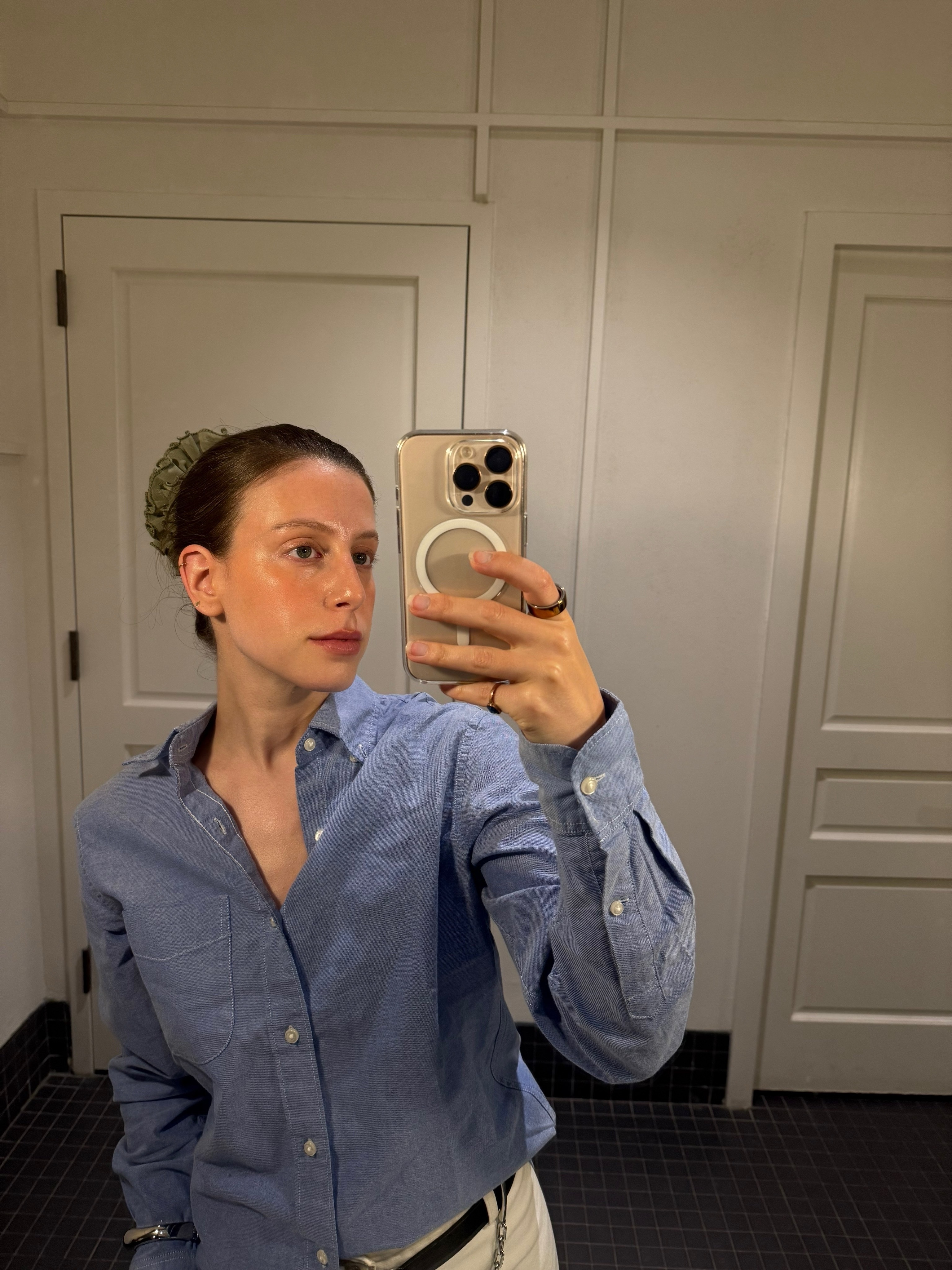 Jamie Schneider testing Bella Hadid's slicked-back bun hack