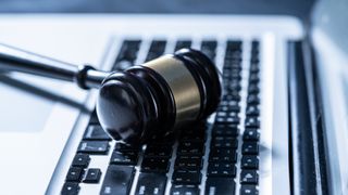 Gavel sits on macbook keyboard