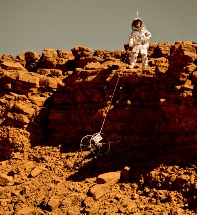 A &#039;Cliffbot&#039; is lowered over some rocks during a field test in Morocco in 2013.