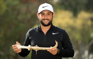 Alex Levy holds the trophy after his victory at the 2018 Trophée Hassan II