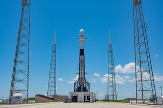 A SpaceX Falcon 9 rocket topped with 60 Starlink internet satellites on the pad at Florida's Cape Canaveral Air Force Station in May 2019.