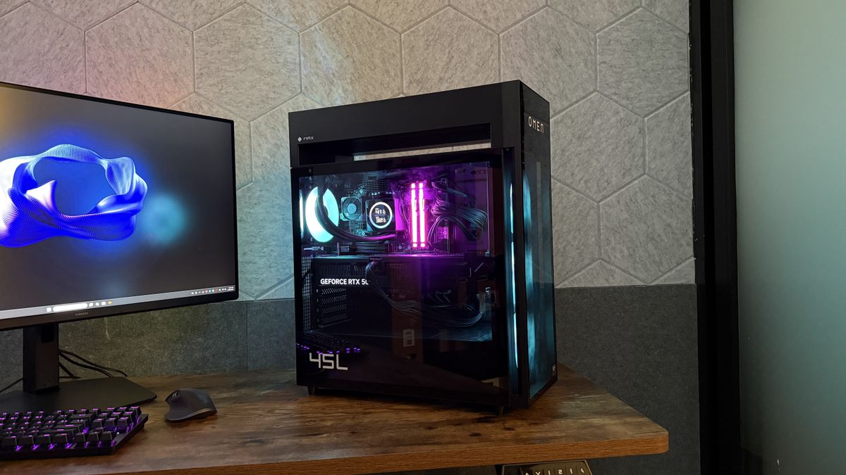 The HP Omen Max 45L on a desk with its RGB lighting enabled