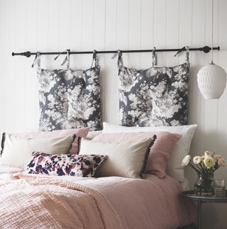 Black and white floral hanging cushion headboard