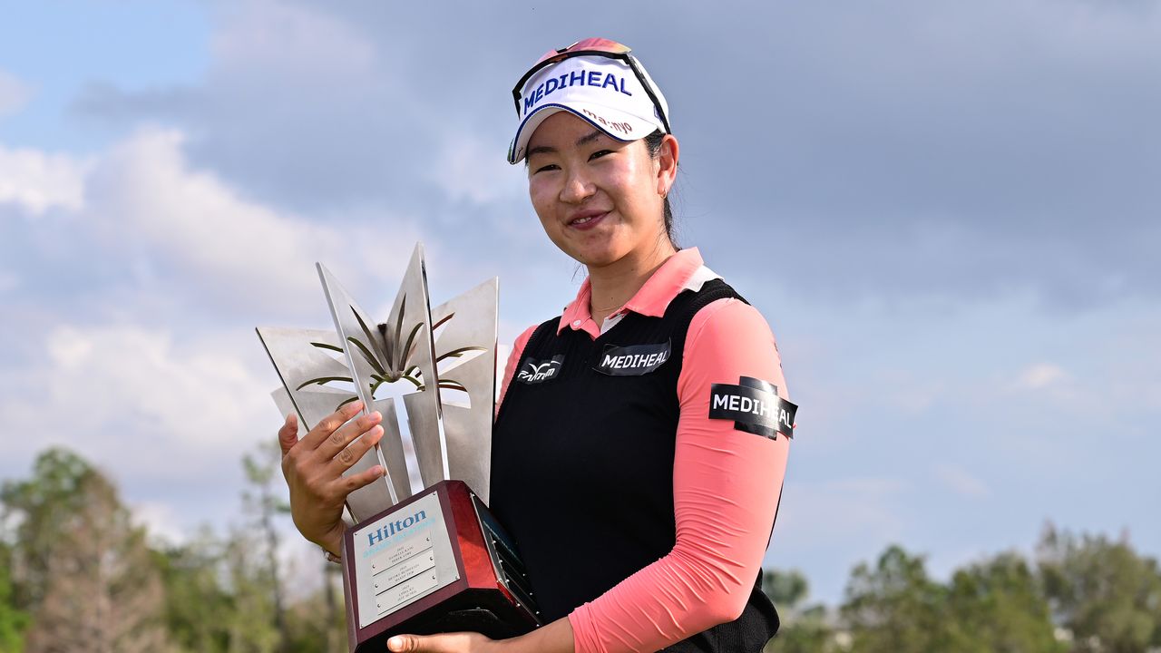 A Lim Kim holds the Hilton Grand Vacations Tournament of Champions trophy after winning in 2025