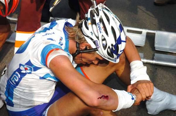 Yoann Offredo (FDJ) sits on the tarmac in Wevelgem.