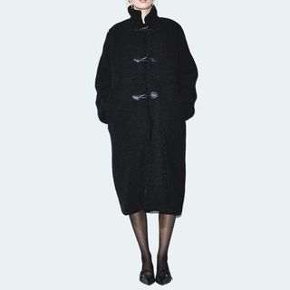 flat lay image of black coat