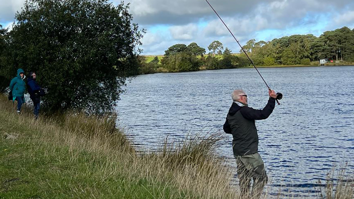 Matheson Green casting a fishing line