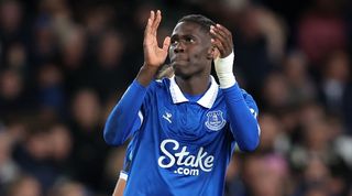 Everton's Amadou Onana applauds the fans after his side's Carabao Cup clash against Burnley in November 2023.