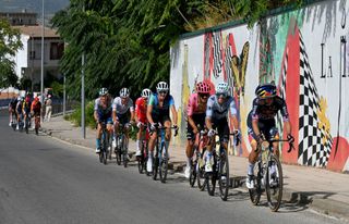 CAZORLA SPAIN AUGUST 24 LR Antonio Tiberi of Italy and Team Bahrain Victorious White Best Young Rider Jersey Ben OConnor of Australia Red Leader Jersey Felix Gall of Austria and Team Decathlon AG2R La Mondiale Richard Carapaz of Ecuador and Team EF Education EasyPost Enric Mas of Spain and Team Movistar and Primoz Roglic of Slovenia and Team Red Bull Bora hansgrohe compete in the breakaway during the La Vuelta 79th Tour of Spain 2024 Stage 8 a159km stage from Ubeda to Cazorla 1056m UCIWT on August 24 2024 in Cazorla Spain Photo by Tim de WaeleGetty Images